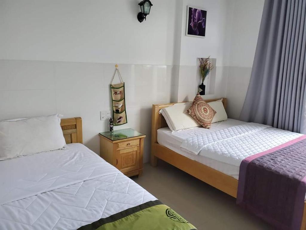 Giường trong phòng chung tại BinhYen Homestay