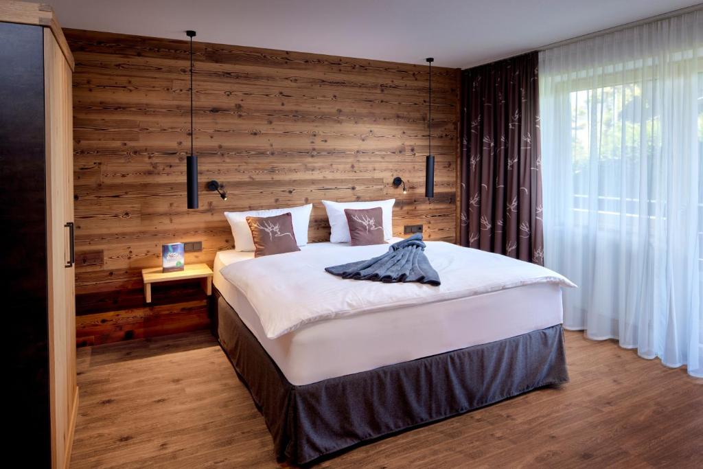 Postel nebo postele na pokoji v ubytování Maximilian Appartements