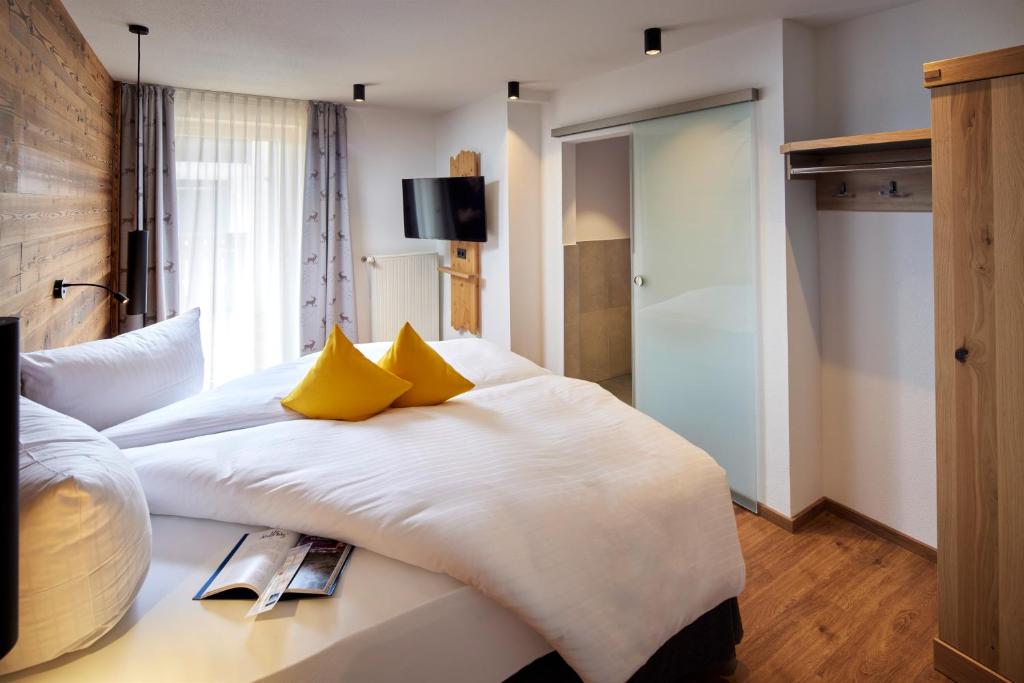 Postel nebo postele na pokoji v ubytování Maximilian Appartements