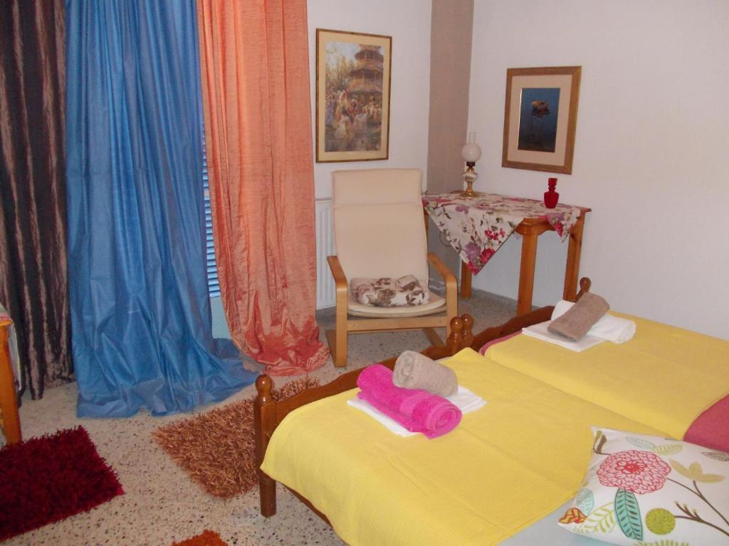 Postel nebo postele na pokoji v ubytování Kassimiotis