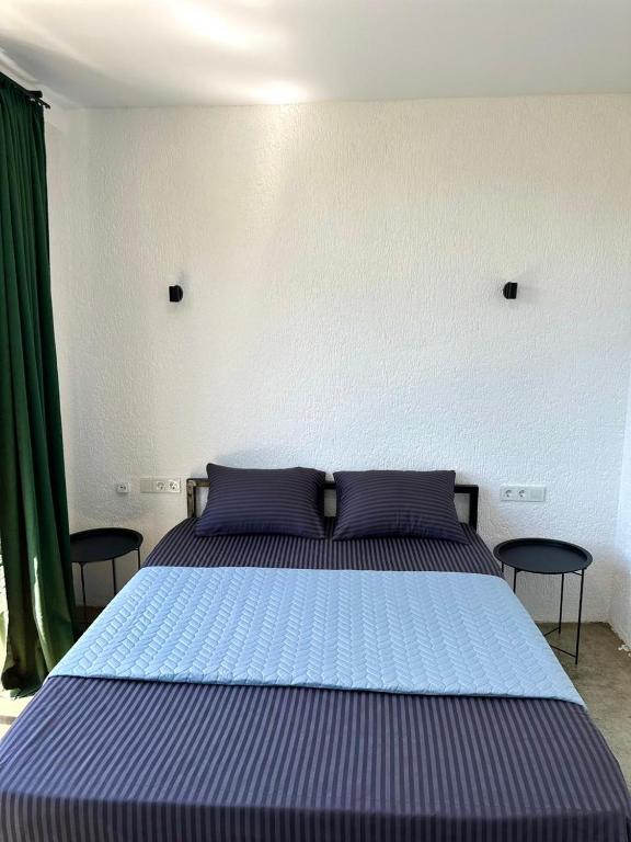 Postel nebo postele na pokoji v ubytování HeyShekvetili