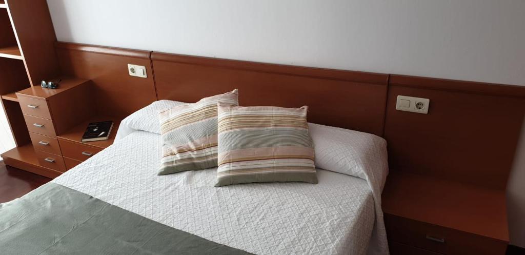 Postel nebo postele na pokoji v ubytování Apartamento Mercedes Quenxe Corcubión