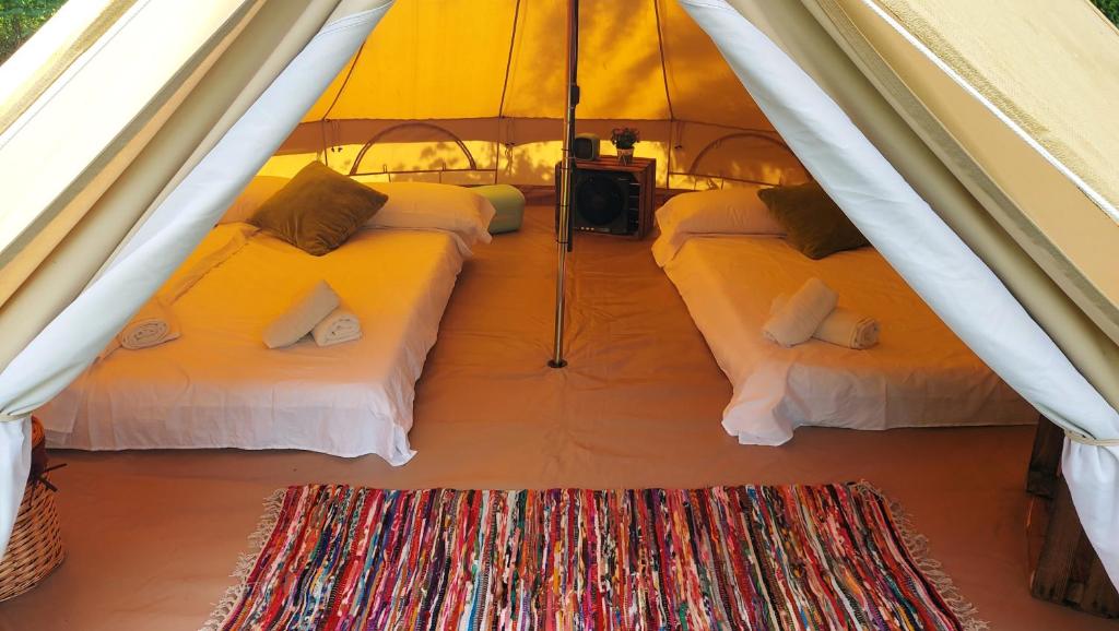 Postel nebo postele na pokoji v ubytování Camping Llavorsi