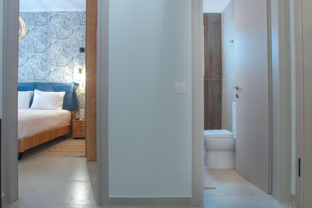 Postel nebo postele na pokoji v ubytování Thiama Apartment in Corfu Port