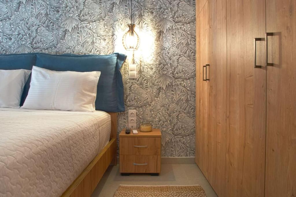 Postel nebo postele na pokoji v ubytování Thiama Apartment in Corfu Port
