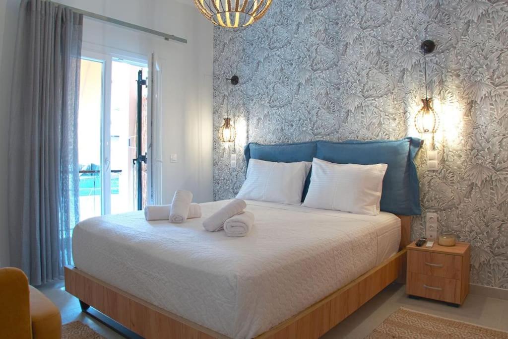 Postel nebo postele na pokoji v ubytování Thiama Apartment in Corfu Port