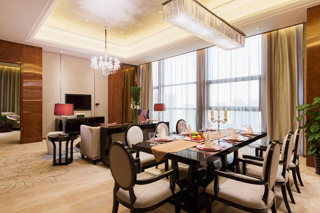 Posezení v ubytování Maanshan Wanda Realm Hotel