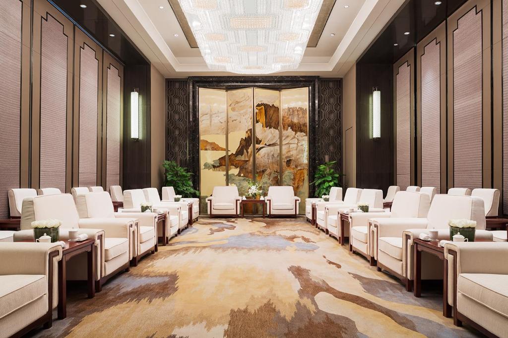 Posezení v ubytování Maanshan Wanda Realm Hotel
