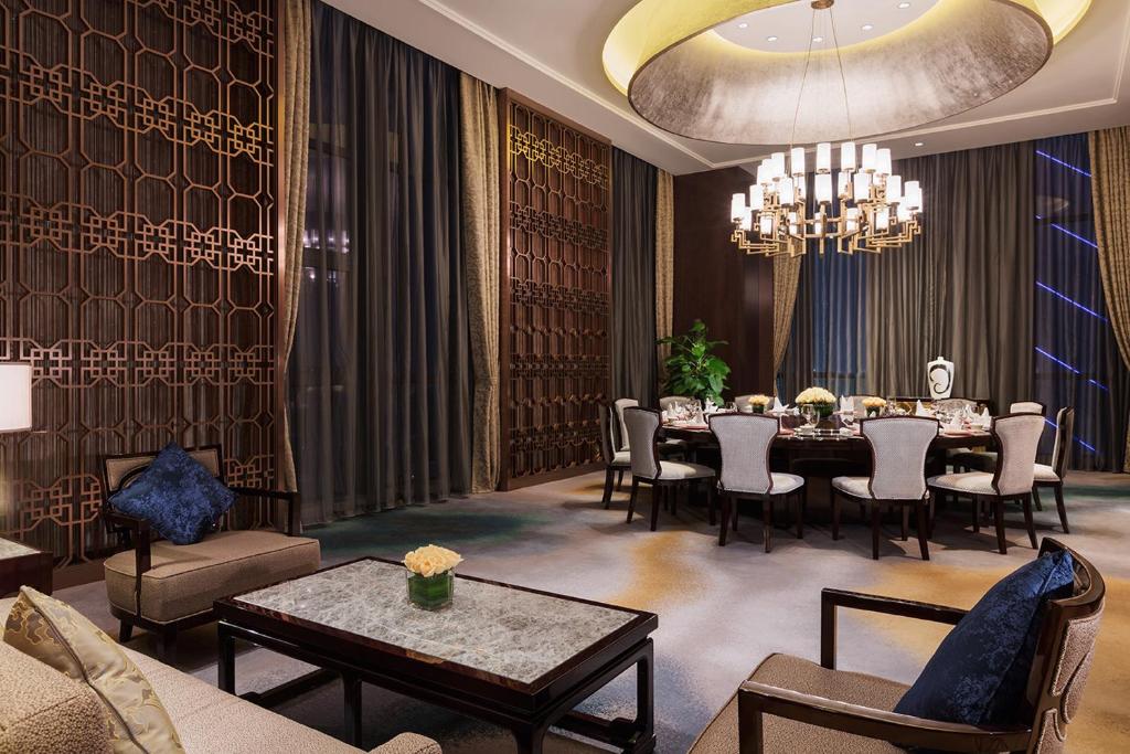 Posezení v ubytování Maanshan Wanda Realm Hotel