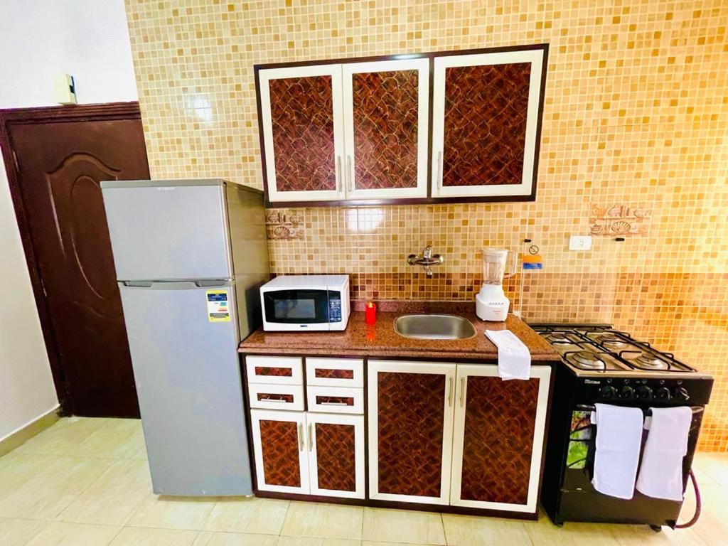 Kuchyň nebo kuchyňský kout v ubytování Charbel apartments