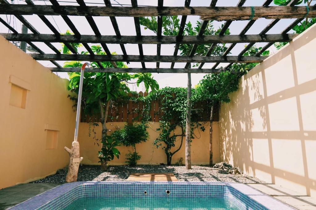 Bazén v ubytování Ding Jia Garden Resort nebo v jeho okolí