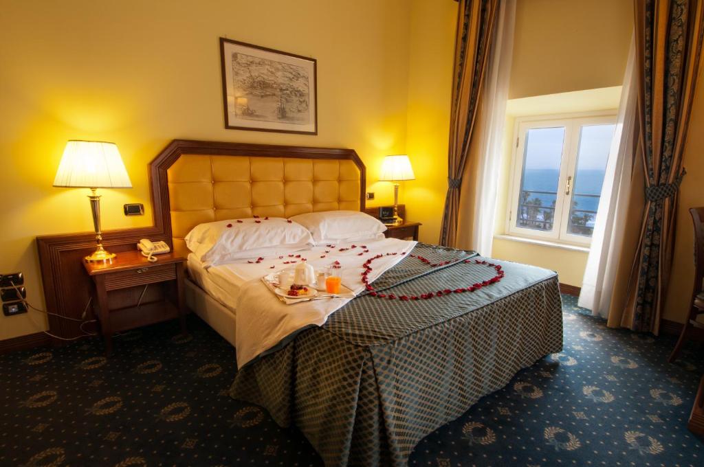 Postel nebo postele na pokoji v ubytování Hotel San Giorgio