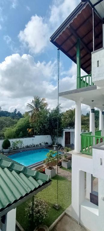 Bazén v ubytování Kaya Residence Kandy nebo v jeho okolí