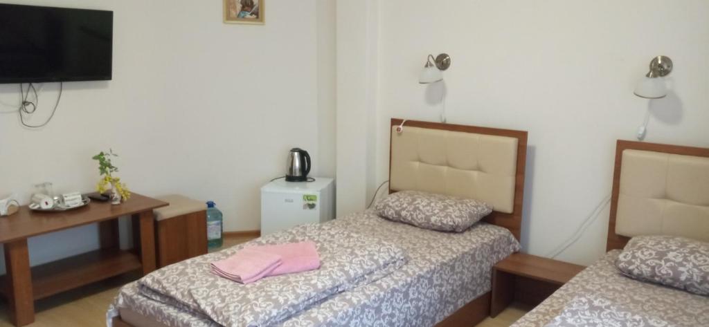 Postel nebo postele na pokoji v ubytování Згадка