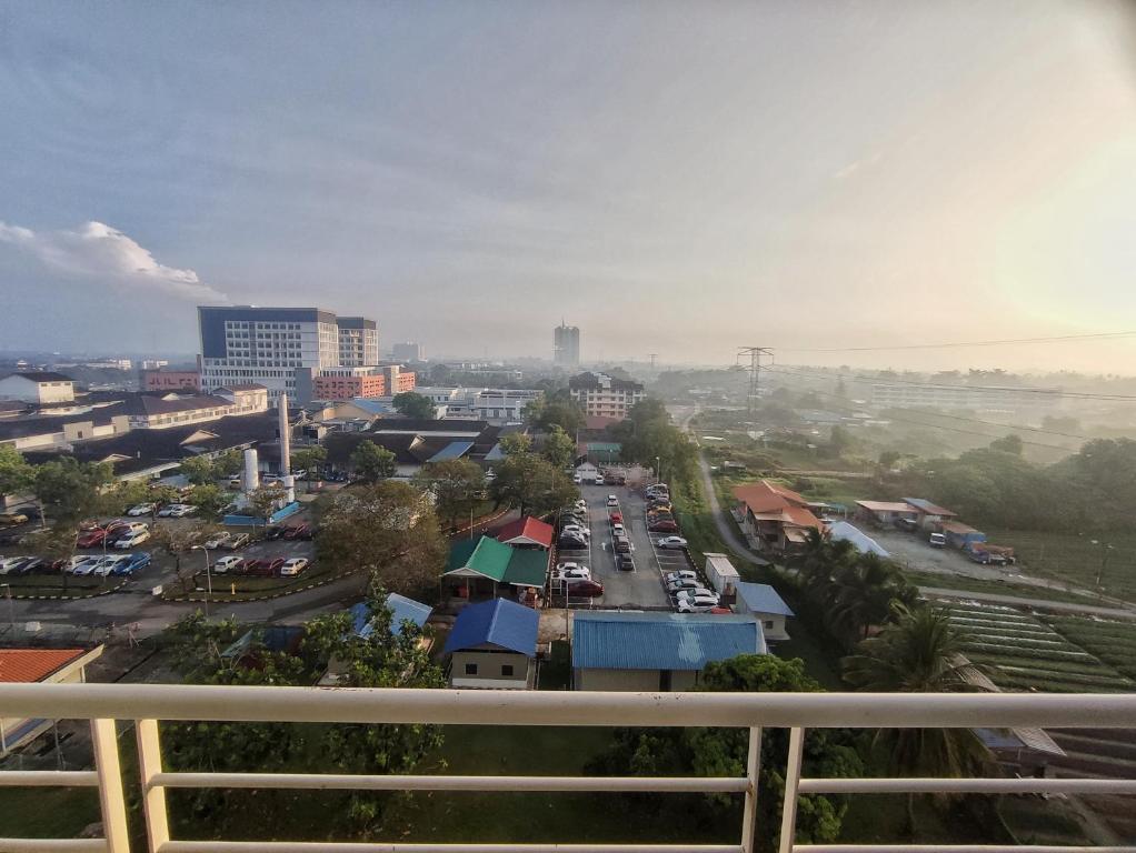 a view of a city from a balcony at KAF Homestay for Musliim only with Pool, 3 Bedroom, Smartkey concept, Kids Trampoline, Game console, WIFI, Durioo in Perai