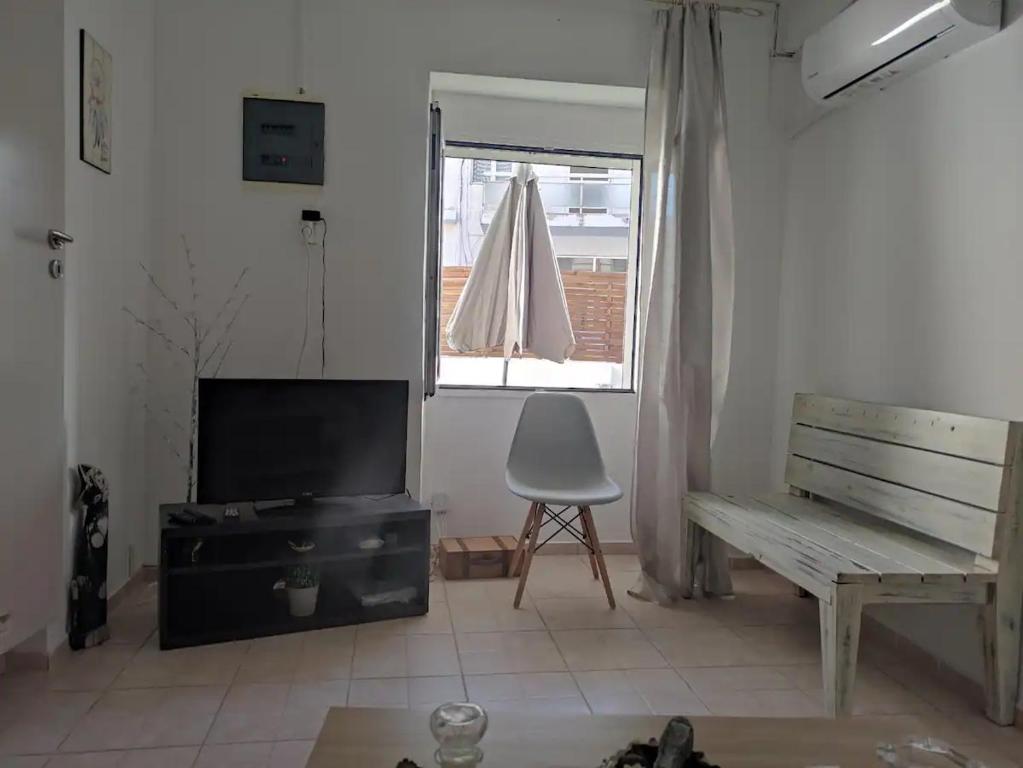 TV a/nebo společenská místnost v ubytování Argyro's vintage House