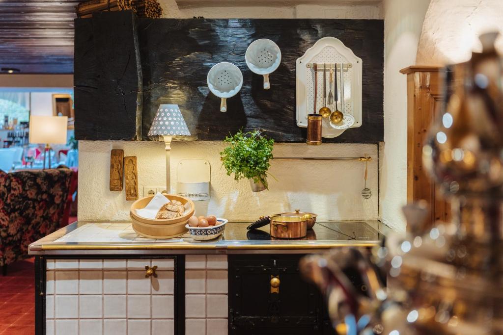 Kuchyň nebo kuchyňský kout v ubytování Hotel Pfeifer