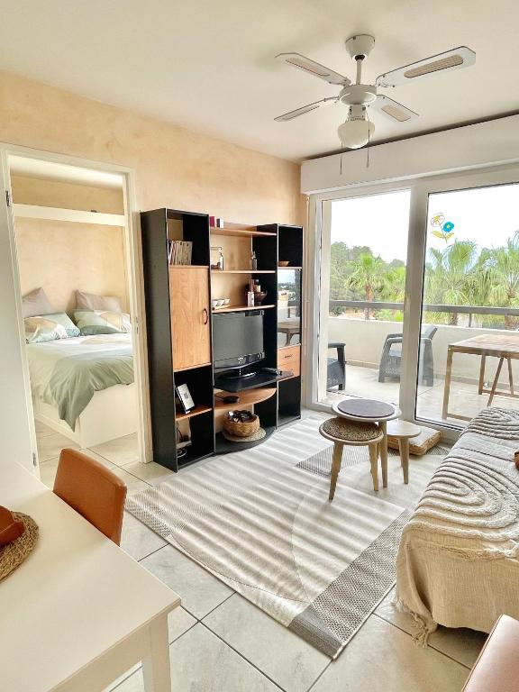 Μια τηλεόραση ή/και κέντρο ψυχαγωγίας στο Appartement vue exceptionnelle