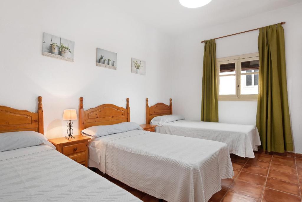 Posteľ alebo postele v izbe v ubytovaní Casa Morales 1