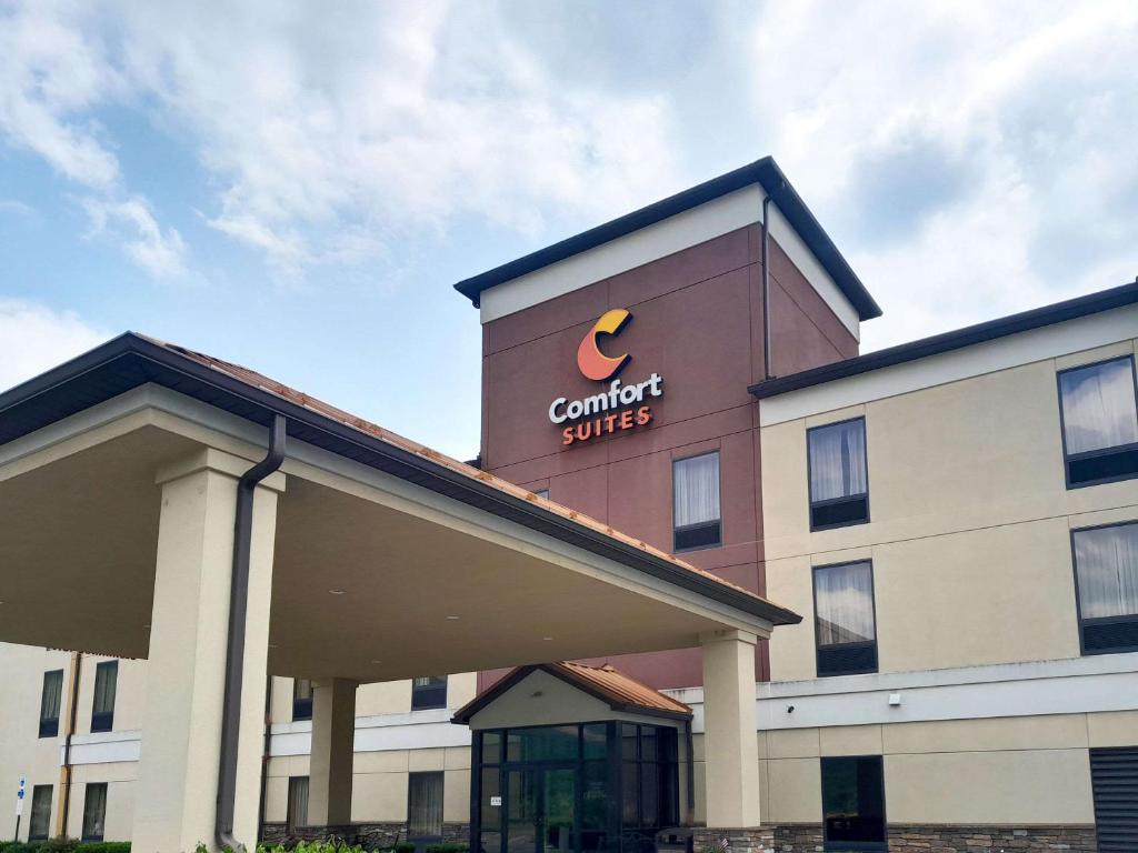 a building with a cambria suites sign on it at Comfort Suites Altoona in Altoona