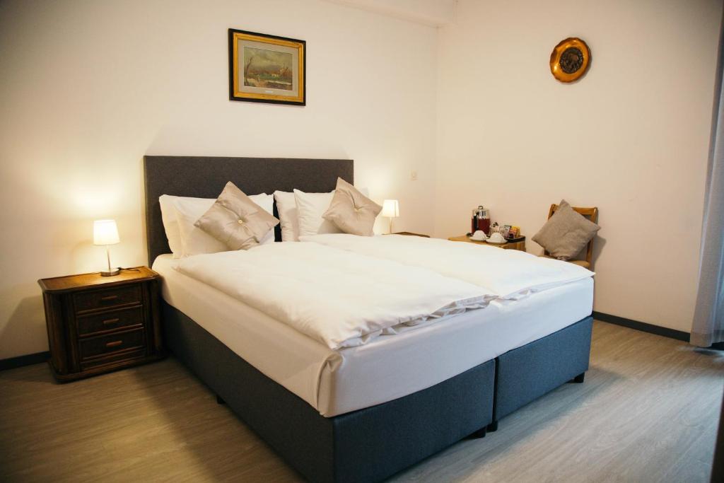 Postel nebo postele na pokoji v ubytování Al Pozz Boutique Resort