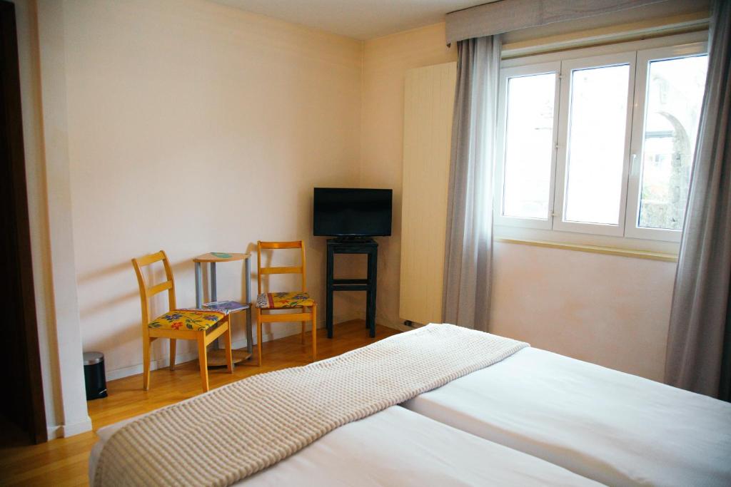 Postel nebo postele na pokoji v ubytování Al Pozz Boutique Resort