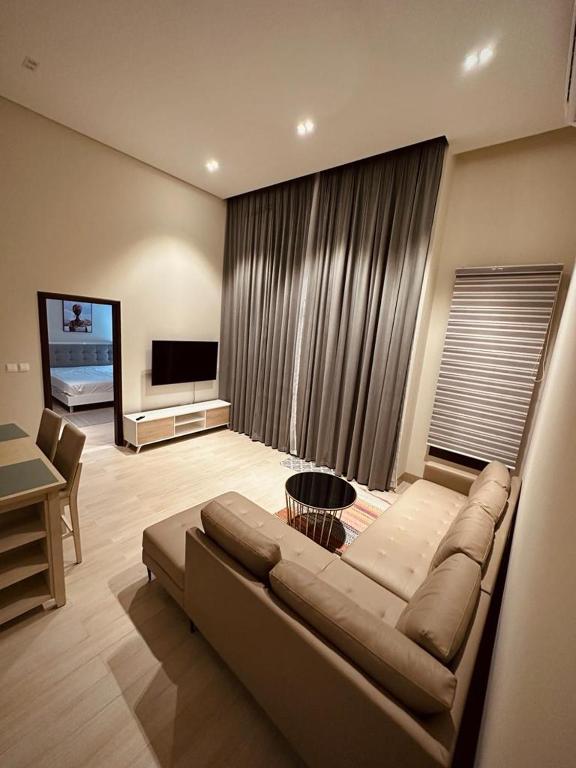 TV a/nebo společenská místnost v ubytování one bedroom villa