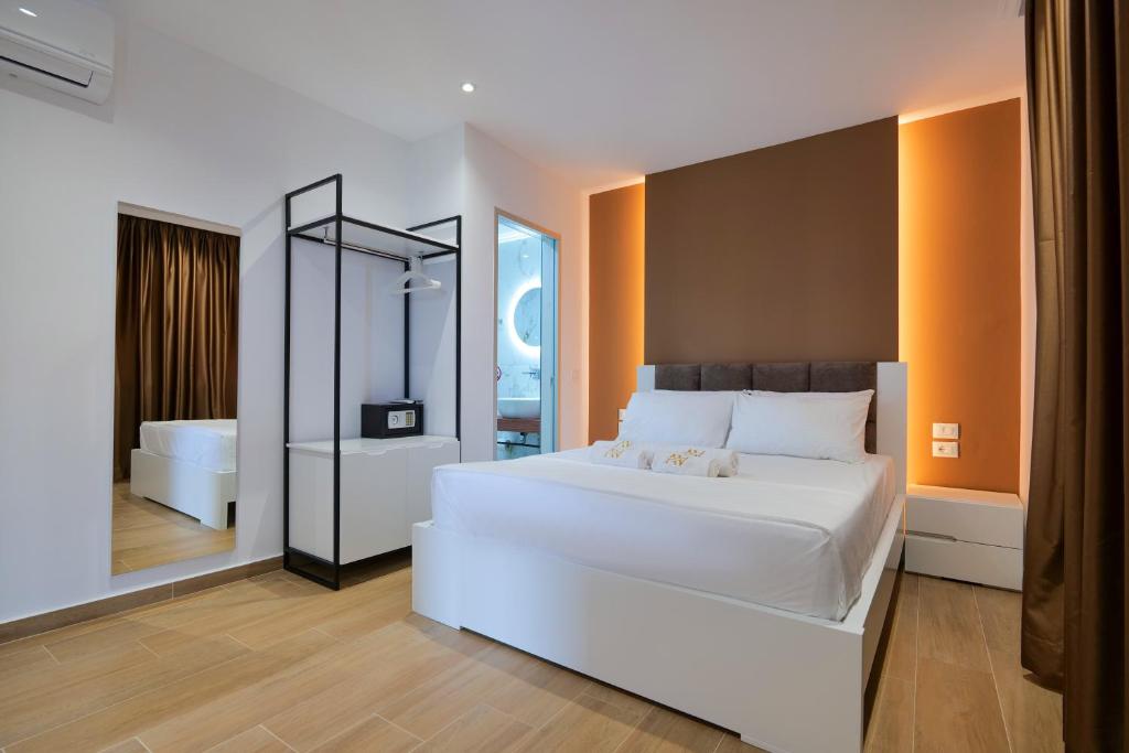 Säng eller sängar i ett rum på ADORA's VIEW HOTEL