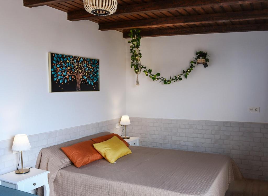 Postel nebo postele na pokoji v ubytování Mini Loft Tesa