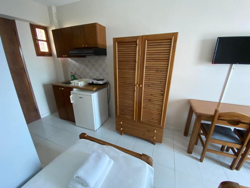 Kuchyň nebo kuchyňský kout v ubytování Hotel Pavlos - Studios