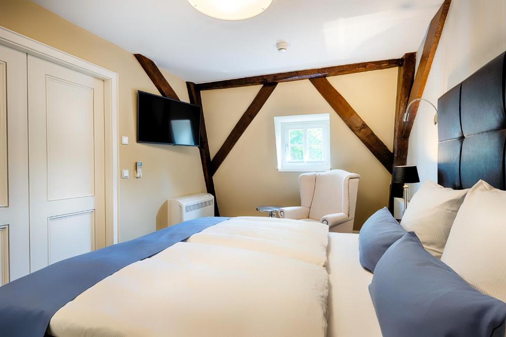 Postel nebo postele na pokoji v ubytování Welcome Hotel Bad Arolsen