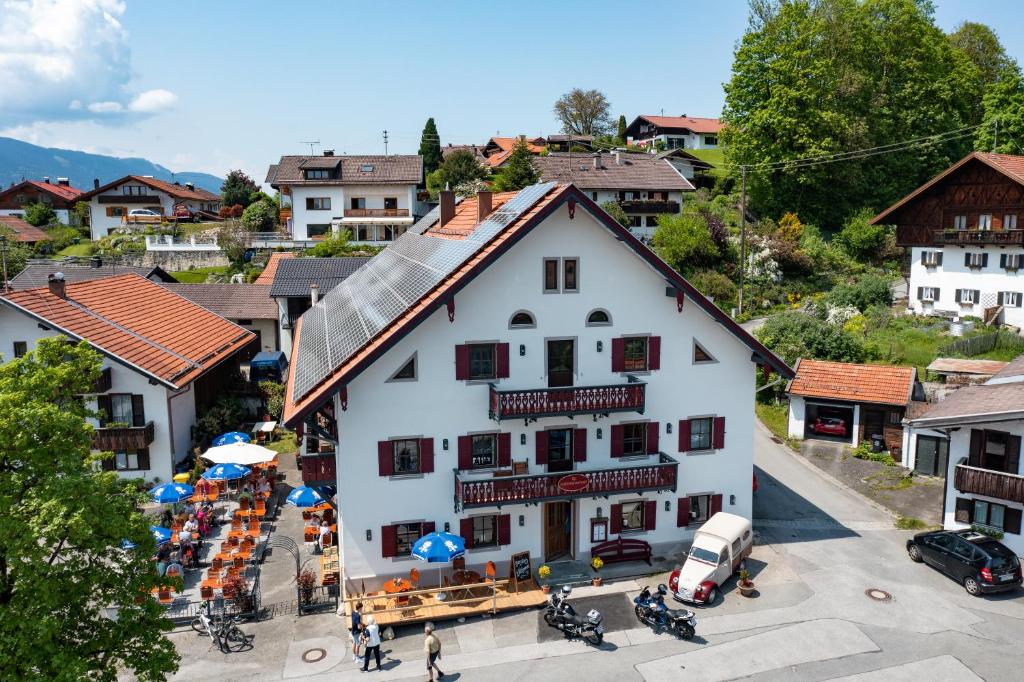 an aerial view of a building in a town at Gasthof zur Post Saulgrub in Saulgrub