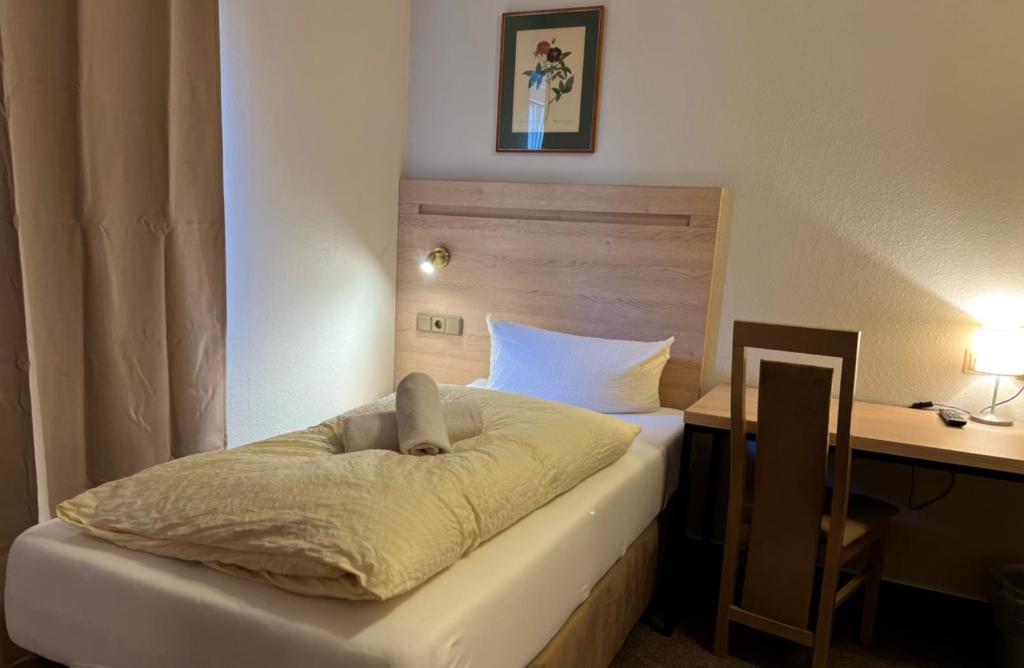 Postel nebo postele na pokoji v ubytování Altes Sudhaus