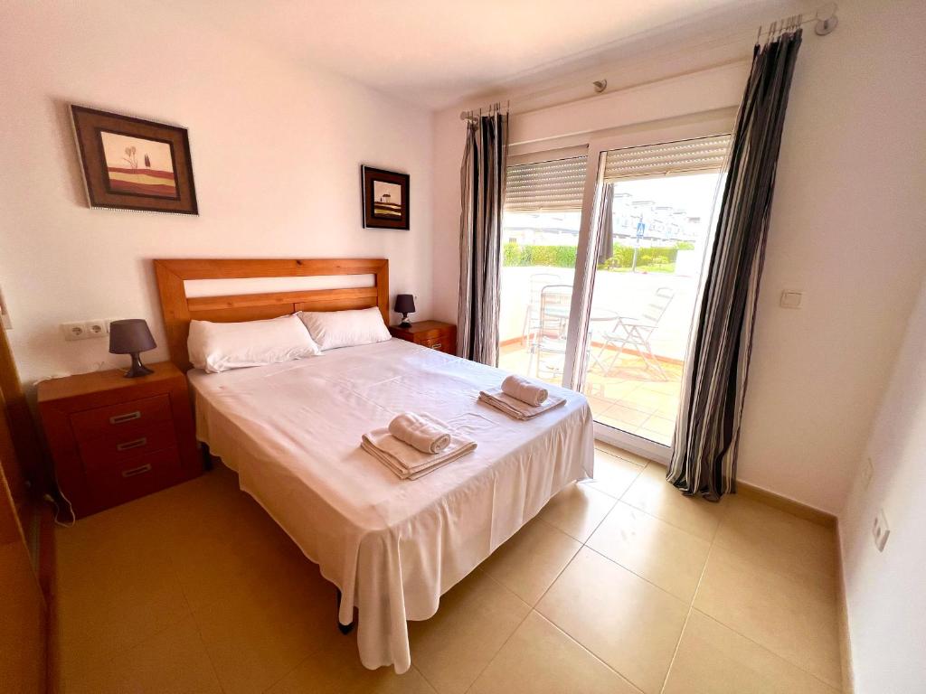 Postel nebo postele na pokoji v ubytování Condado de alhama JARDIN 11 SV25
