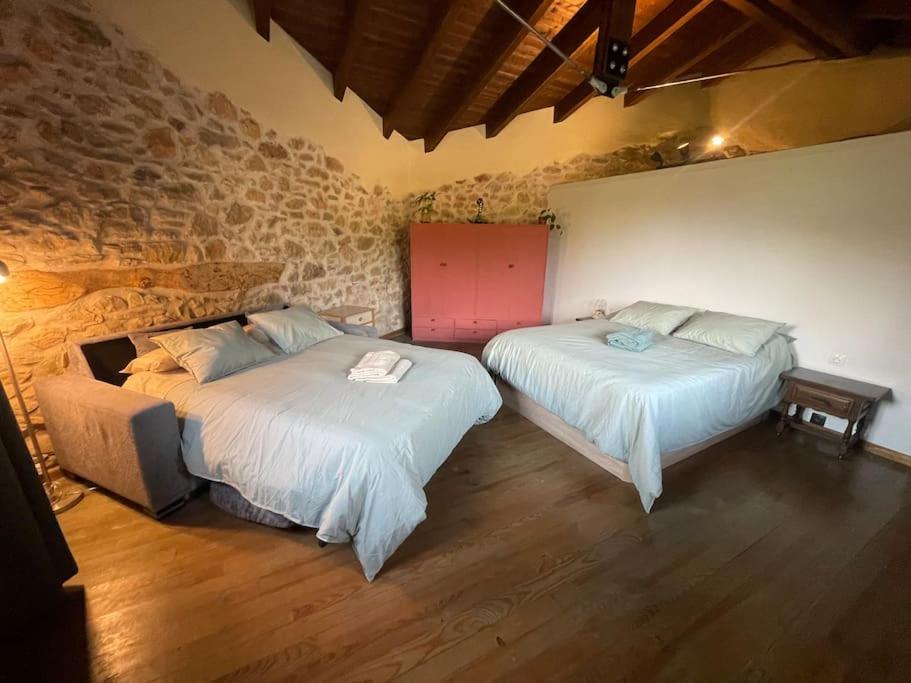 Postel nebo postele na pokoji v ubytování La Morada de Creta
