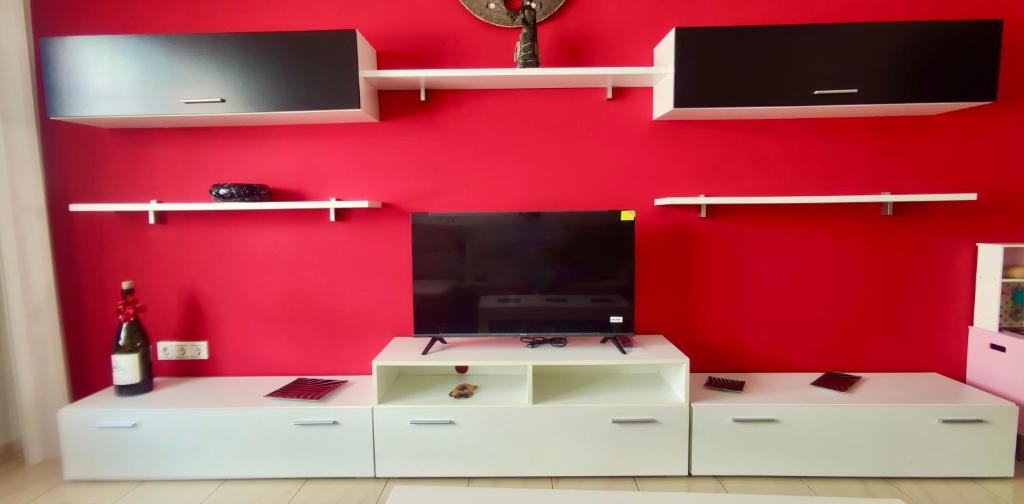 Televízia a/alebo spoločenská miestnosť v ubytovaní Varadero Naval