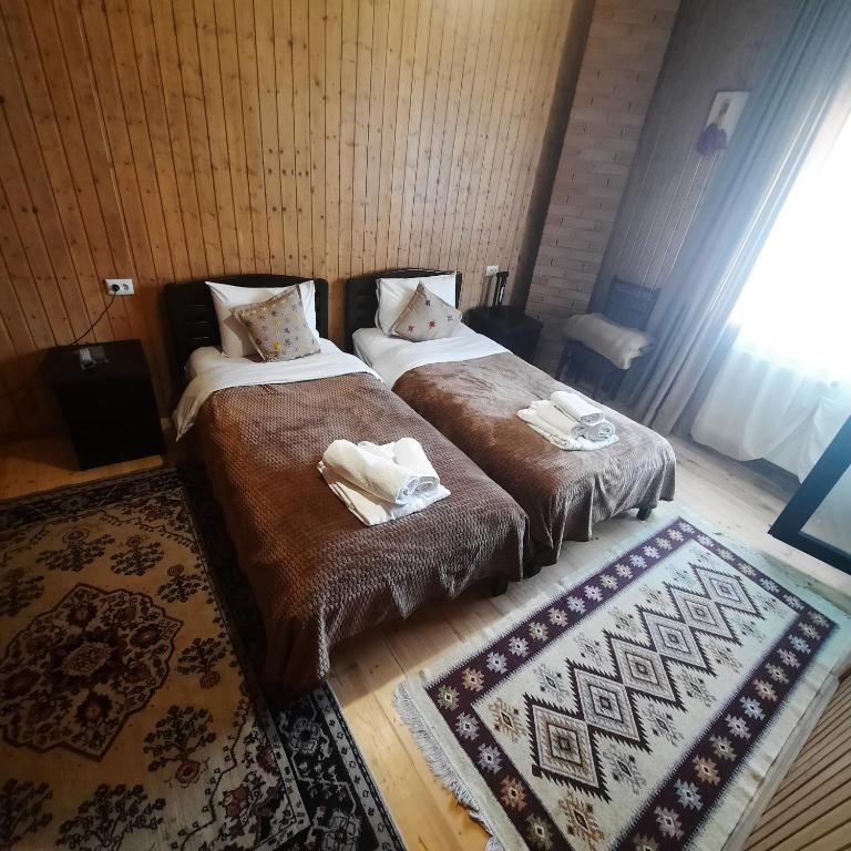 Postel nebo postele na pokoji v ubytování Bana
