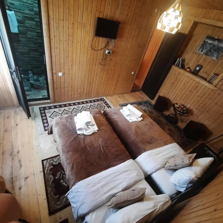 Postel nebo postele na pokoji v ubytování Bana
