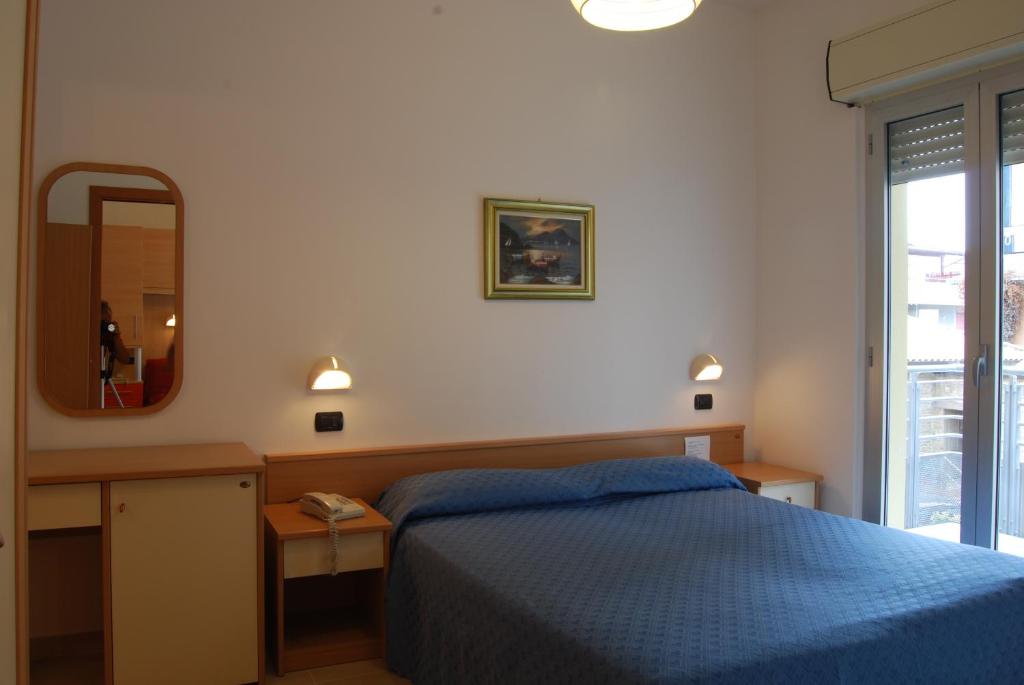 Posteľ alebo postele v izbe v ubytovaní Residence Helene