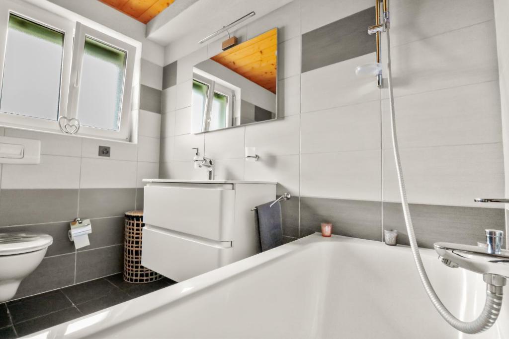 Koupelna v ubytování Logement avec vue sur la plaine