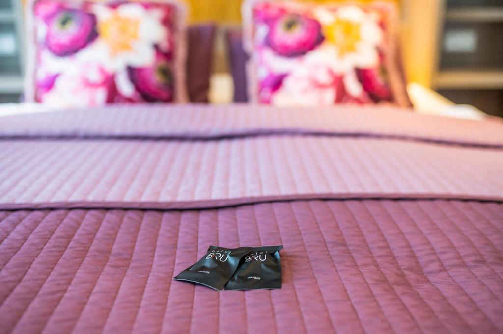 Postel nebo postele na pokoji v ubytování Hotel Bru