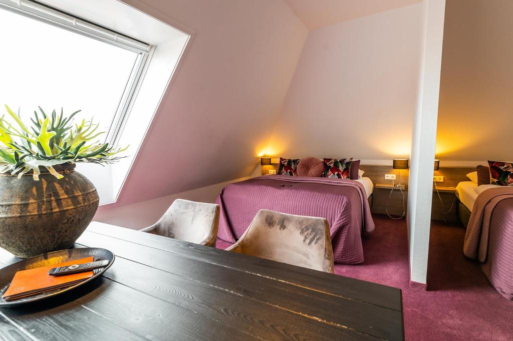 Postel nebo postele na pokoji v ubytování Hotel Bru