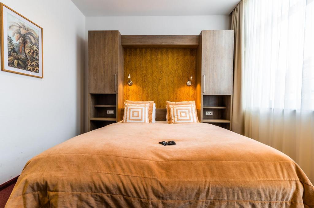 Postel nebo postele na pokoji v ubytování Hotel Bru