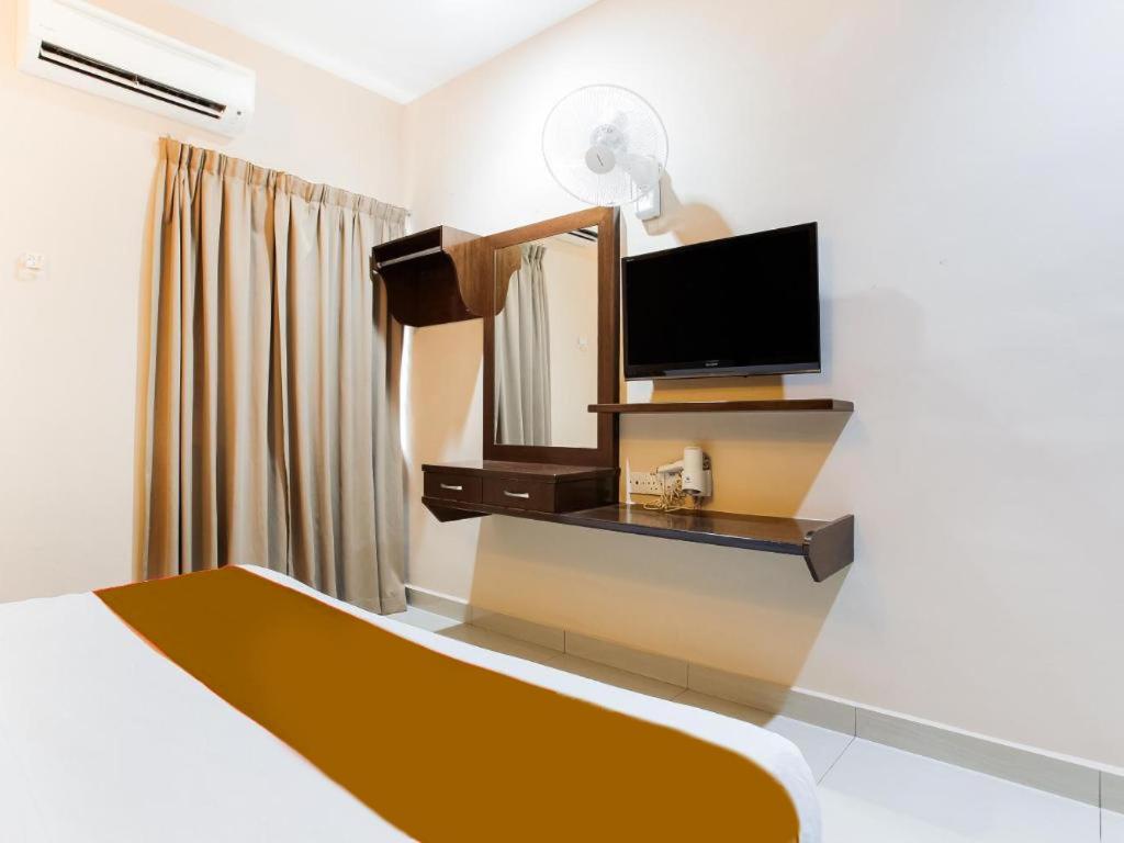 TV a/nebo společenská místnost v ubytování Sejati Hotel