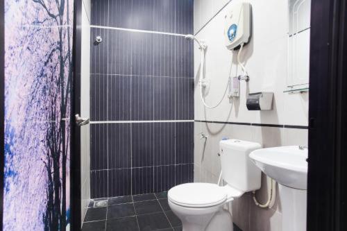 Koupelna v ubytování Sejati Hotel