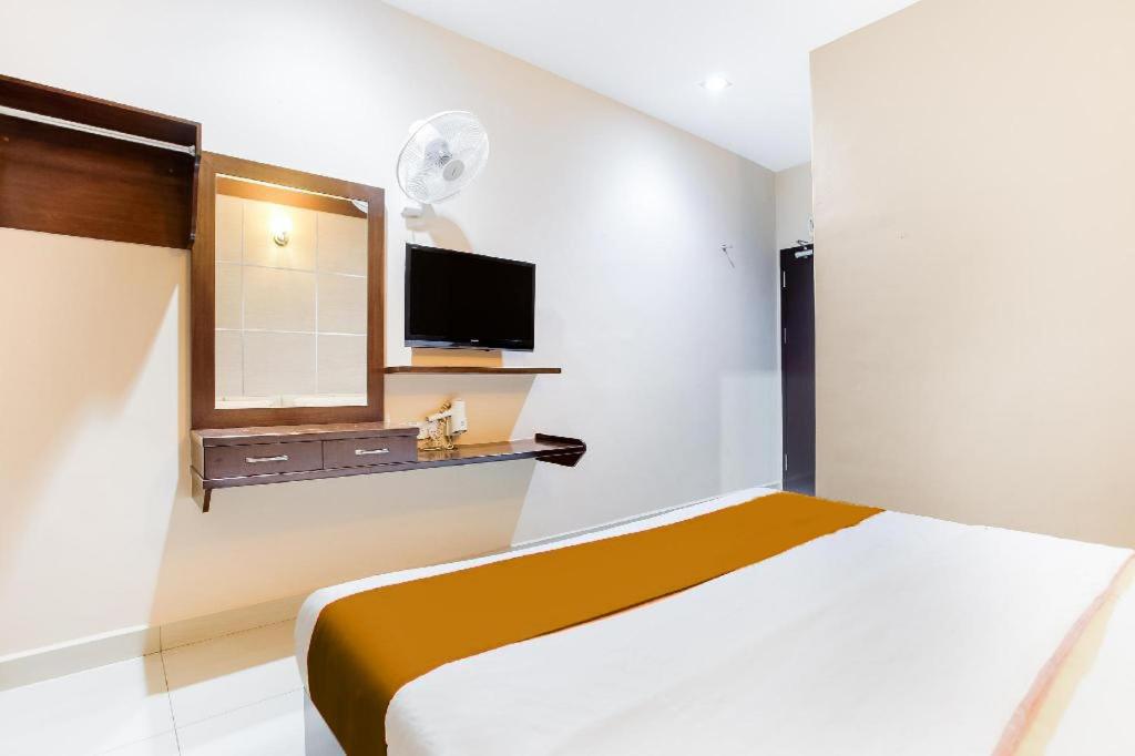 TV a/nebo společenská místnost v ubytování Sejati Hotel