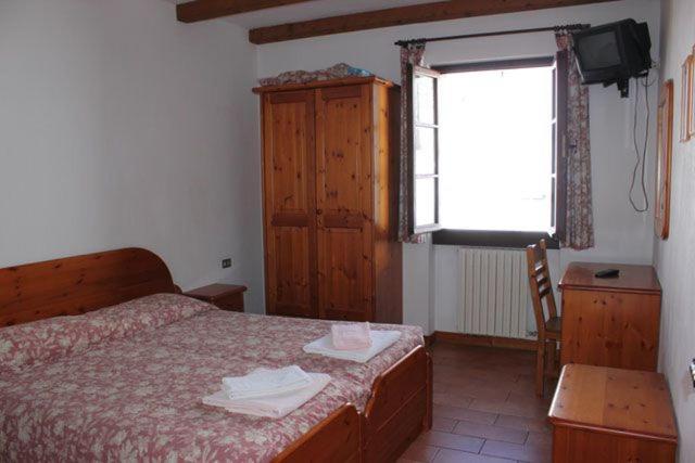 Postel nebo postele na pokoji v ubytování Aalts Dorf