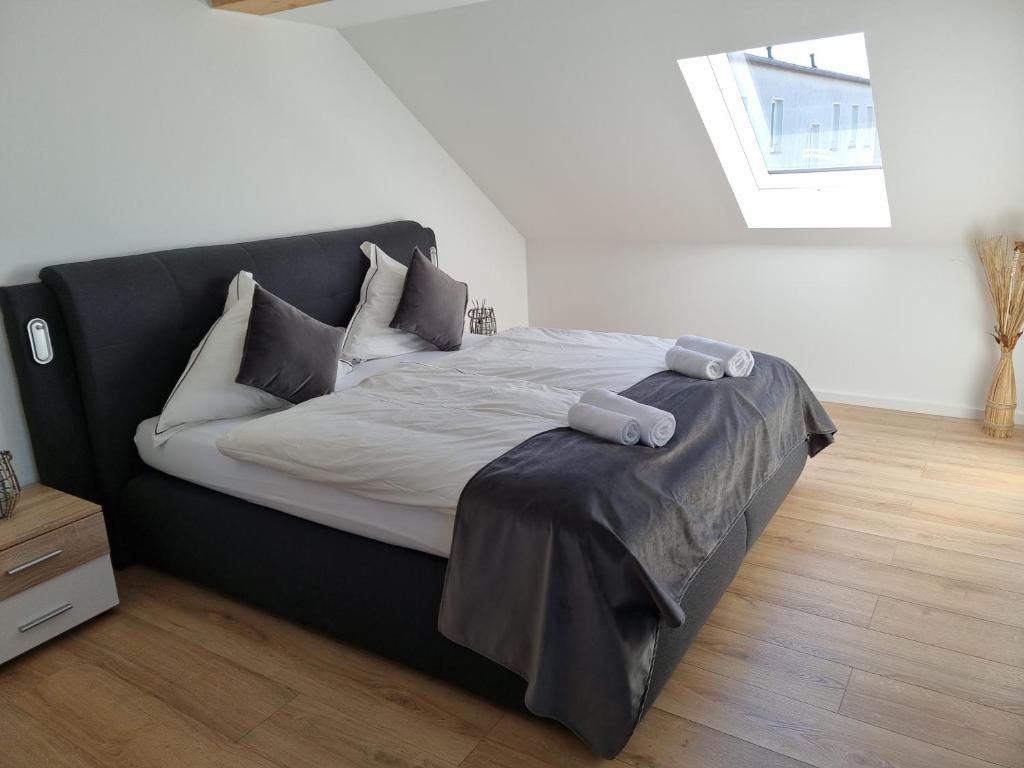 Postel nebo postele na pokoji v ubytování A&F Hotel Chemnitz