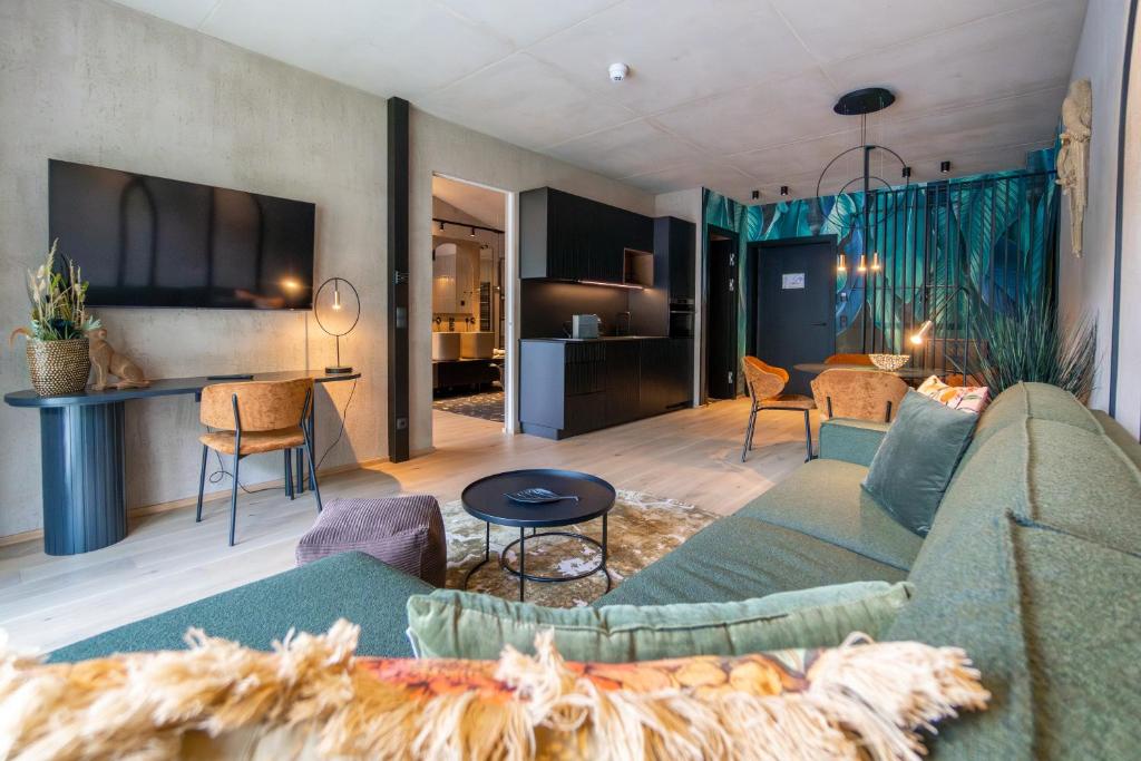 Kuchyň nebo kuchyňský kout v ubytování Lifesteil Aparthotel