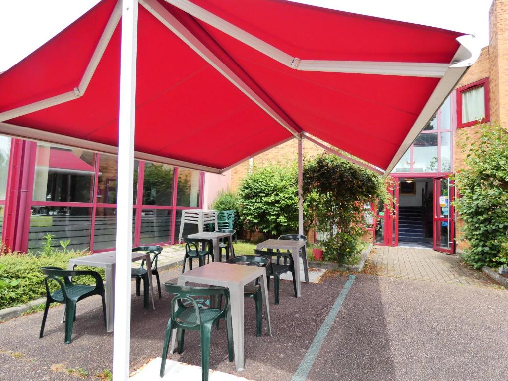 Restaurace v ubytování Hôtel du Parc Limoges & Restaurant "Le temps d'une pause"